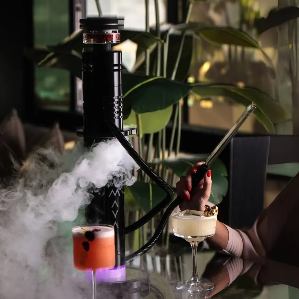 smoke coming out from beautiful shisha model at MYA Dubai