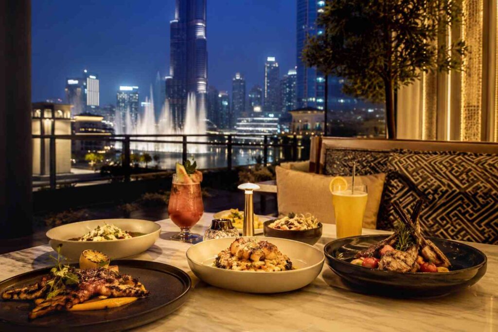 Luxury dining experience at MYA with gourmet dishes, elegant ambiance, and stunning Burj Khalifa and Dubai Fountain views.